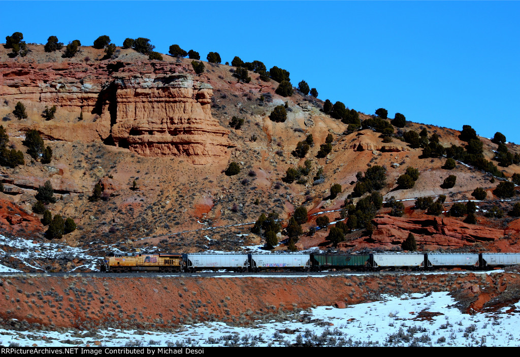 UP 7862 (C45ACCTE) is the rear DPU on an empty eastbound hopper train at Castle Rock, Utah. February 19, 2022 {Winter Echofest}